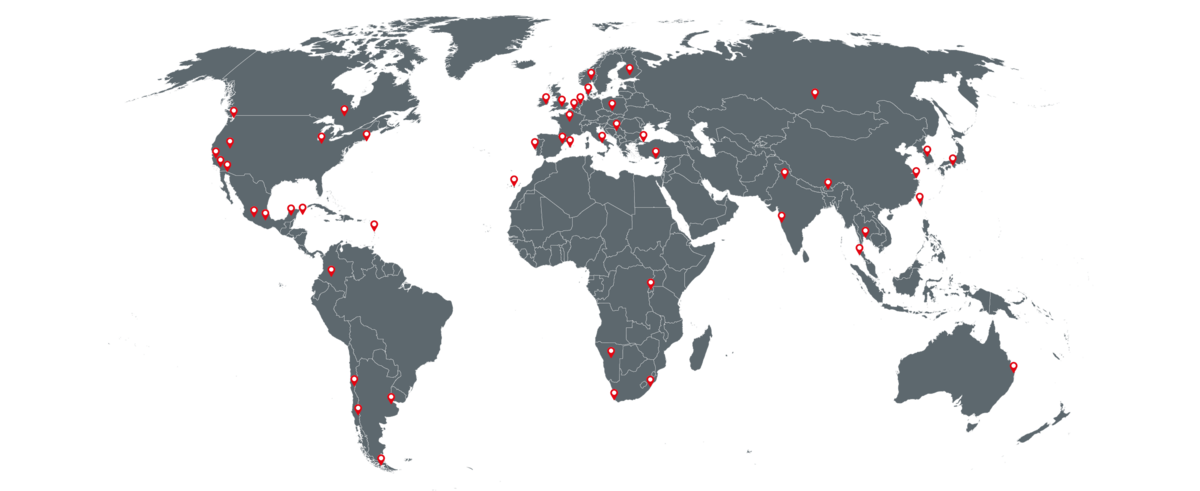Weltkarte, auf der mit roten Punkten die Standorte der Partnerhochschulen gekennzeichnet sind